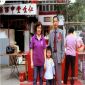 Ng Siu Hung pictured with his wife with their grandkids