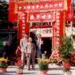 Ng Siu Kei and his mother pictured with the Village Headman